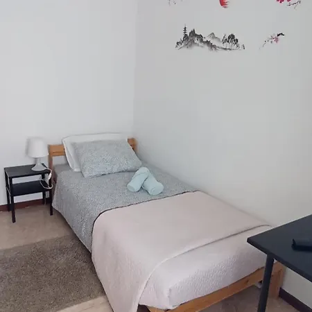 Quarto em Acomodações Particulares Casa Tílias