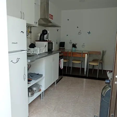 Quarto em Acomodações Particulares Casa Tílias