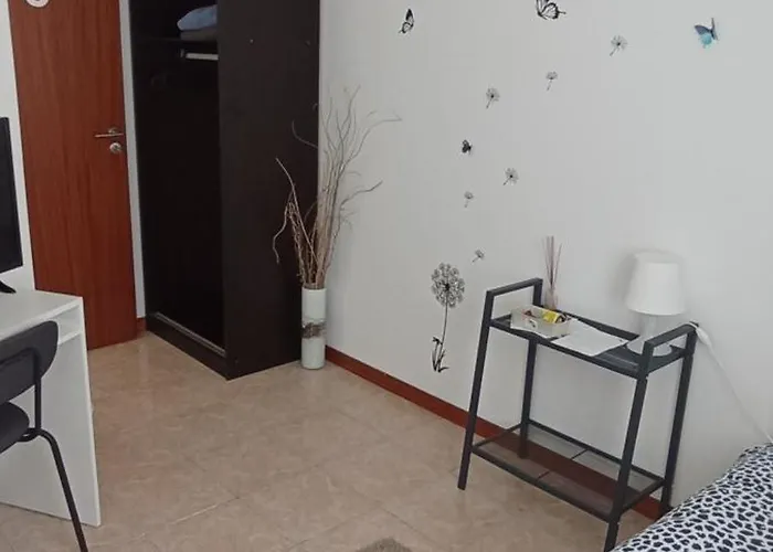 Δωμάτια σε οικογενειακή κατοικία Casa Tilias Κοΐμπρα